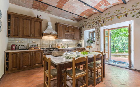 Villa Monterchi: Furniture, Interior Design, Flooring, Wood, Ceiling, Floor, Kitchen, Countertop, Dining Room, Kitchen & Dining Room Table