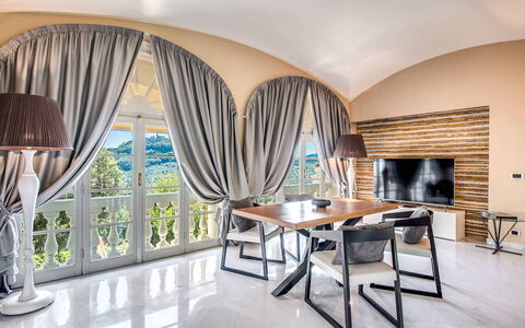 Villa la Brezza: Furniture, Interior Design, Couch, Flooring, Floor, Lighting, Living Room, Table, Ceiling, Home