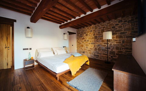 Villa Torre del Chianti: Wall, Interior Design, Flooring, Furniture, Wood, Bedroom, Floor, Bed, Ceiling, Wood Flooring