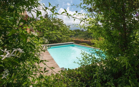 La Rocca di Monteggiori: Green, Swimming Pool, Shrub, Garden, Resort, Backyard, Landscaping, Shade, Eco Hotel, Water Feature