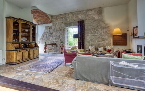 La Rocca di Monteggiori: Furniture, Wall, Flooring, Interior Design, Floor, Ceiling, Couch, Living Room, Room, Chair