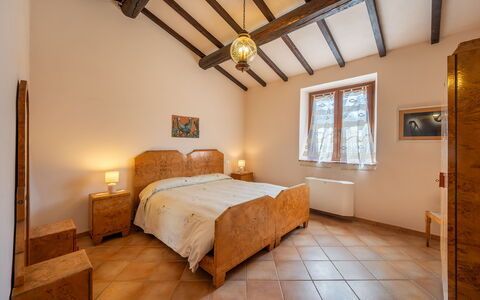 Il Giuncheto Apartments, Pool, Umbrian Countryside: Bed, Furniture, Bedroom, Interior Design, Wall, Bed Sheet, Bedding, Wood, Ceiling, Room