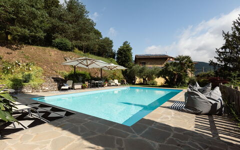 Villa Essiccatoio: Swimming Pool, Outdoor Furniture, Resort, Flagstone, Umbrella, Composite Material, Leisure, Eco Hotel, Chair, Shade