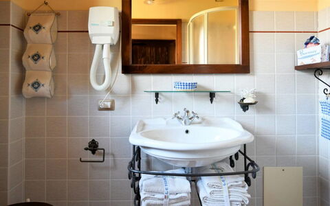 Terre di Giano Private Pool and View, Umbria: Interior Design, Plumbing Fixture, Flooring, Furniture, Bathroom Sink, Floor, Sink, Tap, Lighting, Bathroom