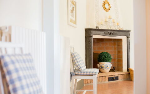 Villa Camelia: Furniture, Wall, Interior Design, Wood, Flooring, Floor, Lighting, Room, Picture Frame, Living Room