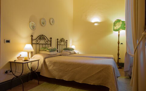 Villa Camelia: Bed, Furniture, Interior Design, Bedroom, Bedding, Bed Sheet, Wall, Floor, Wood, Flooring