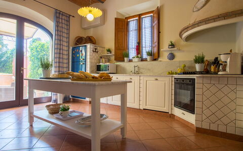 Villa Camelia: Furniture, Interior Design, Flooring, Kitchen, Wood, Floor, Countertop, Table, Home, Room
