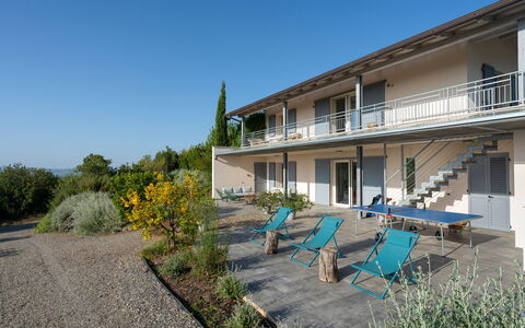 Villa Ombrone: Shrub, Balcony, Porch, Estate, Shade, Villa, Yard, Landscaping, Farmhouse, Outdoor Furniture