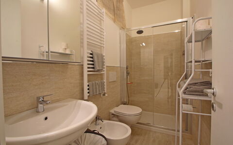 Il Centro: Interior Design, Flooring, Floor, Room, Ceiling, Apartment, Chair, Toilet, Sink, Plumbing Fixture