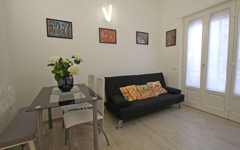 Il Centro: Furniture, Flooring, Floor, Interior Design, Wall, Wood, Room, Wood Flooring, Couch, Living Room