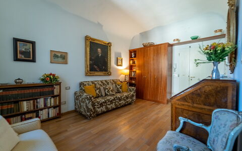 Casa dello Scrittore: Furniture, Interior Design, Wall, Flooring, Wood, Floor, Couch, Picture Frame, Room, Living Room