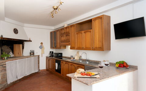 Villa i Fiori: Cabinetry, Kitchen, Furniture, Interior Design, Countertop, Flooring, Wood, Ceiling, Kitchen Appliance, Room