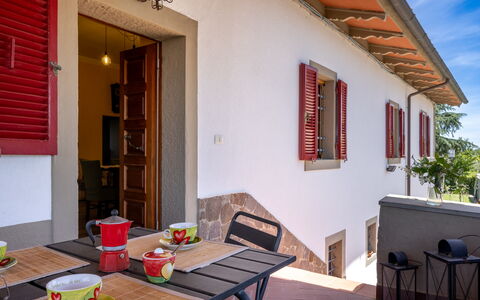 Il Cipresso, Casa dei Nonni, Cortona: Wood, Door, House, Home, Wood Stain, Cottage, Hardwood, Shade, Houseplant, Porch