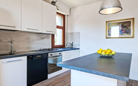 Le 3 Viste: Countertop, Kitchen, Flooring, Kitchen Appliance, Interior Design, Cabinetry, Floor, Wood, Furniture, Major Appliance