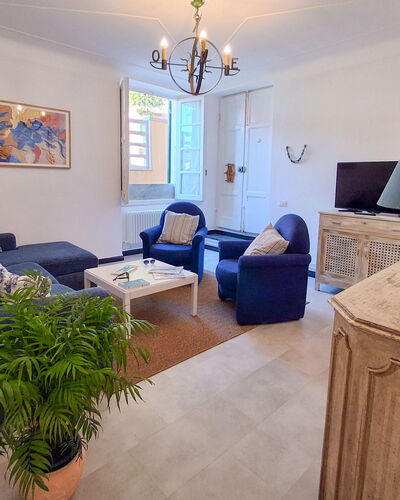La Riva - Levanto: Furniture, Interior Design, Flooring, Floor, Couch, Wood, Living Room, Room, Ceiling, Table