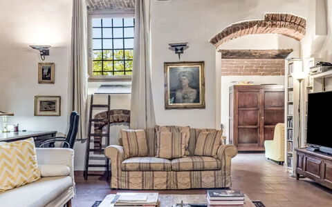 Il Pozzo dei Desideri: Furniture, Interior Design, Wood, Couch, Flooring, Living Room, Ceiling, Floor, Room, Chair