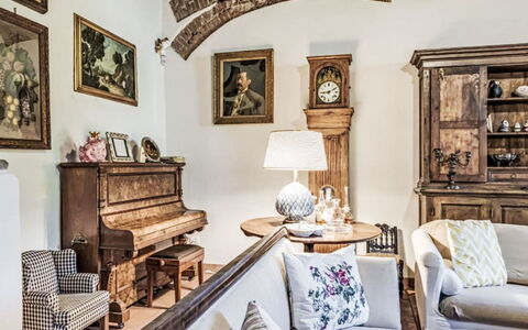 Il Pozzo dei Desideri: Furniture, Interior Design, Wood, Flooring, Living Room, Room, Picture Frame, Table, Floor, Lighting
