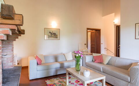 Podere Calcheto 14: Furniture, Interior Design, Flooring, Wall, Floor, Couch, Wood, Room, Living Room, Ceiling