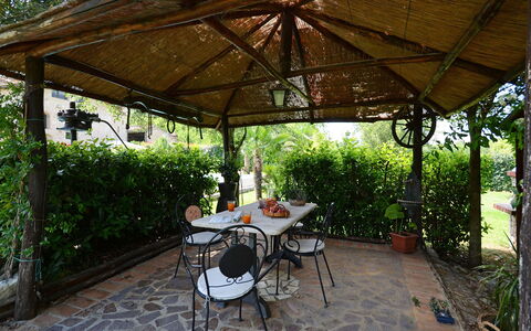La Capanna di Franca 6+2: Furniture, Shade, Garden, Outdoor Structure, Outdoor Table, Chair, Outdoor Furniture, Backyard, Gazebo, Flagstone