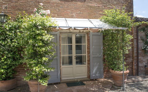 Albachiara 8: Flowerpot, Door, Houseplant, Shade, Home Door, Garden, Awning, Outdoor Structure, Yard