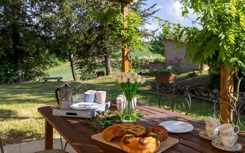 Podere Madonna di Mezzo 6: Furniture, Table, Tableware, Food, Outdoor Furniture, Outdoor Table, Serveware, Tablecloth, Chair