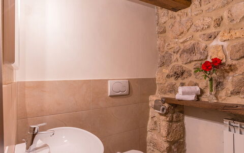 Santa Illuminata 12: Wall, Interior Design, Flooring, Floor, Room, Ceiling, Plumbing Fixture, Sink, Bathroom, Stone Wall