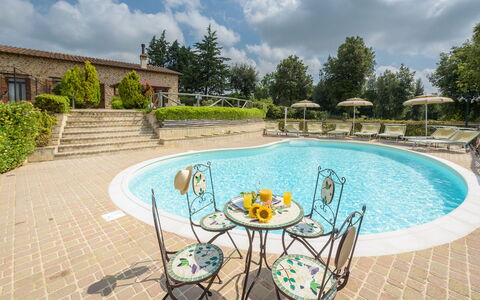 L'Ovile 8: Outdoor Furniture, Swimming Pool, Resort, Chair, Garden, Landscaping, Outdoor Table, Yard, Eco Hotel, Houseplant
