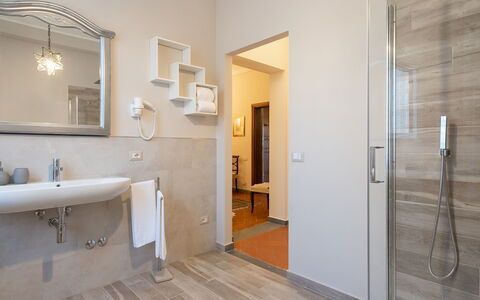 Villa Fiorentini 10: Flooring, Floor, Interior Design, Room, Furniture, Lighting, Plumbing Fixture, Ceiling, Home, Door