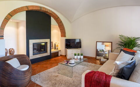 La Villa Nell'Isola Verde 12: Furniture, Interior Design, Wall, Flooring, Couch, Floor, Living Room, Ceiling, Room, Lighting