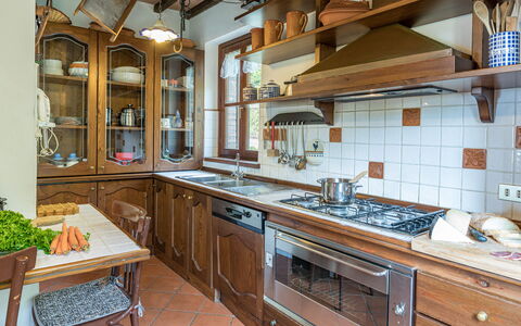 Villa Paola 6: Kitchen, Countertop, Interior Design, Cabinetry, Furniture, Wood, Kitchen Appliance, Flooring, Major Appliance, Ceiling
