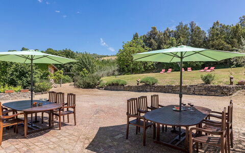 Podere le Corone 14: Furniture, Outdoor Furniture, Table, Outdoor Table, Chair, Garden, Kitchen & Dining Room Table, Umbrella, Shade, Landscaping