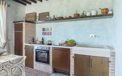Le Residenze dei Potti 12: Wall, Furniture, Flooring, Wood, Interior Design, Kitchen, Floor, Countertop, Room, Home