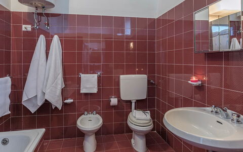 Villa le Logge 12: Bathroom, Plumbing Fixture, Interior Design, Flooring, Sink, Bathroom Sink, Floor, Tap, Toilet Seat, Toilet