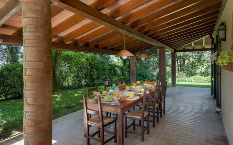 Villa Paesante 8: Furniture, Wood, Table, Kitchen & Dining Room Table, Chair, Porch, Ceiling, Outdoor Structure, Outdoor Furniture, Shade