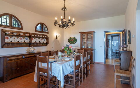 Villa ai Venti 8: Furniture, Interior Design, Table, Wood, Flooring, Kitchen & Dining Room Table, Ceiling, Dining Room, Chair, Light Fixture