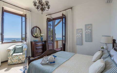 Villa ai Venti 8: Furniture, Floor, Interior Design, Sea, Bedroom, Linens, Resort, Chair, Apartment, Ocean
