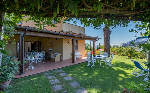 Villa ai Venti 8: Garden, Furniture, Backyard, Chair, Outdoor Furniture, Shade, Yard, Resort, Eco Hotel, Lawn