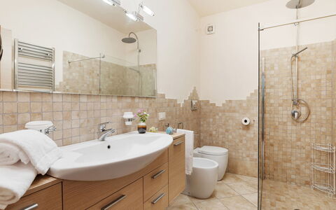 Villa Castiglione 9: Bathroom, Bathroom Sink, Plumbing Fixture, Flooring, Interior Design, Sink, Floor, Bathroom Cabinet, Toilet, Mirror