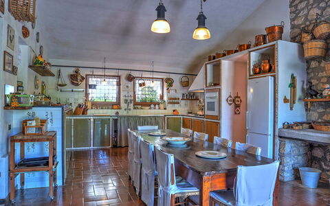 Casale Tre Cipressi 10: Furniture, Kitchen, Interior Design, Table, Lighting, Flooring, Ceiling, Countertop, Chair, Cabinetry