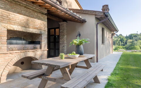Agriresort Bacaringhe 13: Furniture, Wood, Outdoor Furniture, Table, Outdoor Table, Kitchen & Dining Room Table, Chair, Brick, Garden, Shade