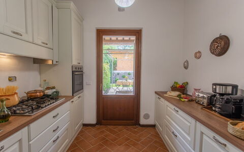 La Collina degli Ulivi 8+2: Kitchen, Countertop, Kitchen Appliance, Flooring, Interior Design, Cabinetry, Wood, Major Appliance, Floor, Home