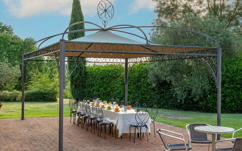 Podere Sant'Eugenio 14: Garden, Shade, Pavilion, Gazebo, Outdoor Structure, Outdoor Furniture, Landscaping, Yard, Lawn, Outdoor Table