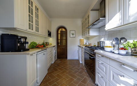 Podere Vernine di Sotto 14: Kitchen, Countertop, Flooring, Interior Design, Cabinetry, Kitchen Appliance, Wood, Major Appliance, Floor, Furniture