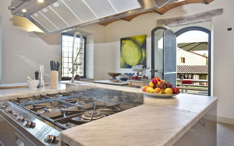 La Maccinaia 14: Countertop, Property, Room, Yellow, Ceiling, Interior Design, Building, Kitchen, Furniture, Home