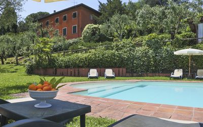 Villa Oleandri: Property, Swimming Pool, Backyard, Residential Area, House, Real Estate, Yard, Home, Grass, Building