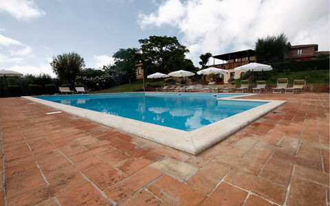 Sanguineto: Cloud, Sky, Water, Swimming Pool, Building, Plant, Azure, Tree, Shade, Rectangle