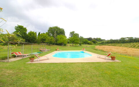 Santa Vittoria: Cloud, Sky, Plant, Water, Tree, Natural Landscape, Shade, Land Lot, Swimming Pool, Grass
