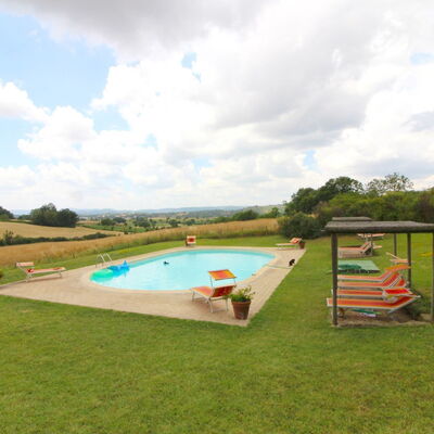 Santa Vittoria: Cloud, Sky, Plant, Tree, Swimming Pool, Land Lot, Shade, Grass, Outdoor Furniture, Cumulus