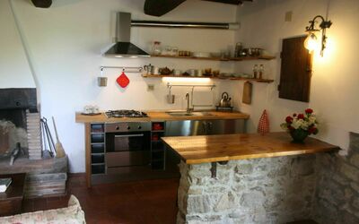 Casa Linda: Countertop, Room, Property, Furniture, Kitchen, Building, Floor, Interior Design, Cabinetry, House