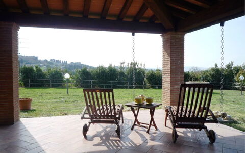 Nonno Tobia: Plant, Sky, Property, Furniture, Outdoor Bench, Porch, Shade, Wood, House, Outdoor Furniture